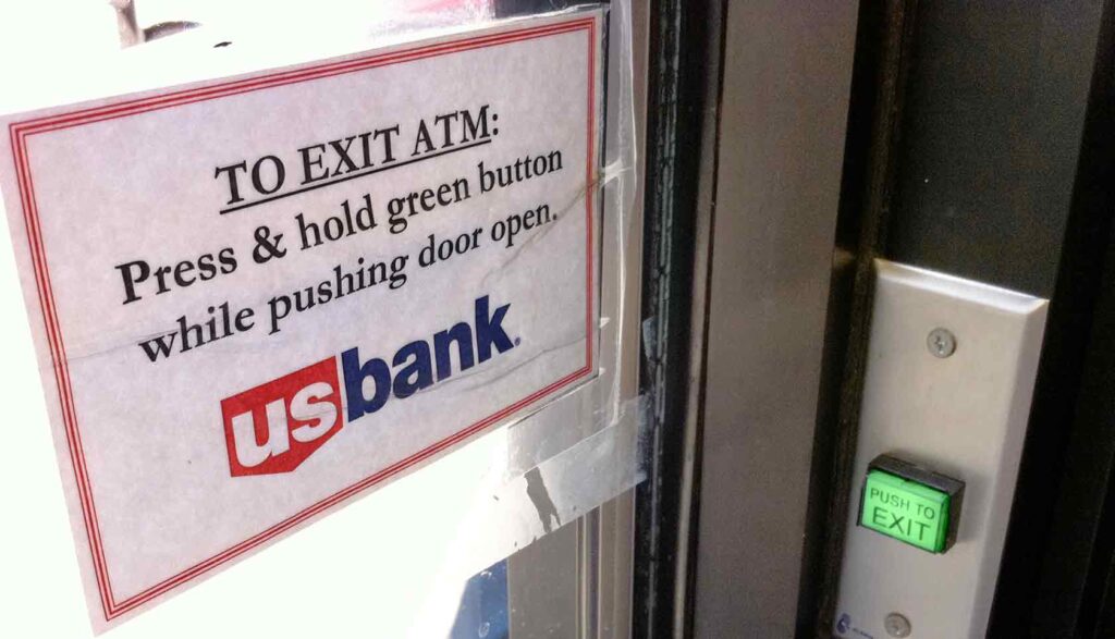 one sign next to button
