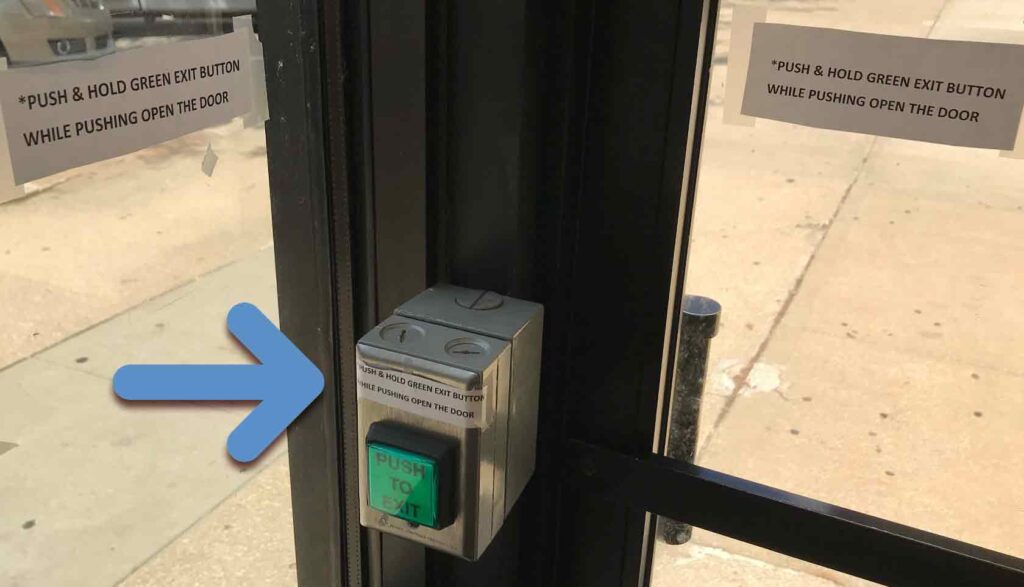 three signs next to button
